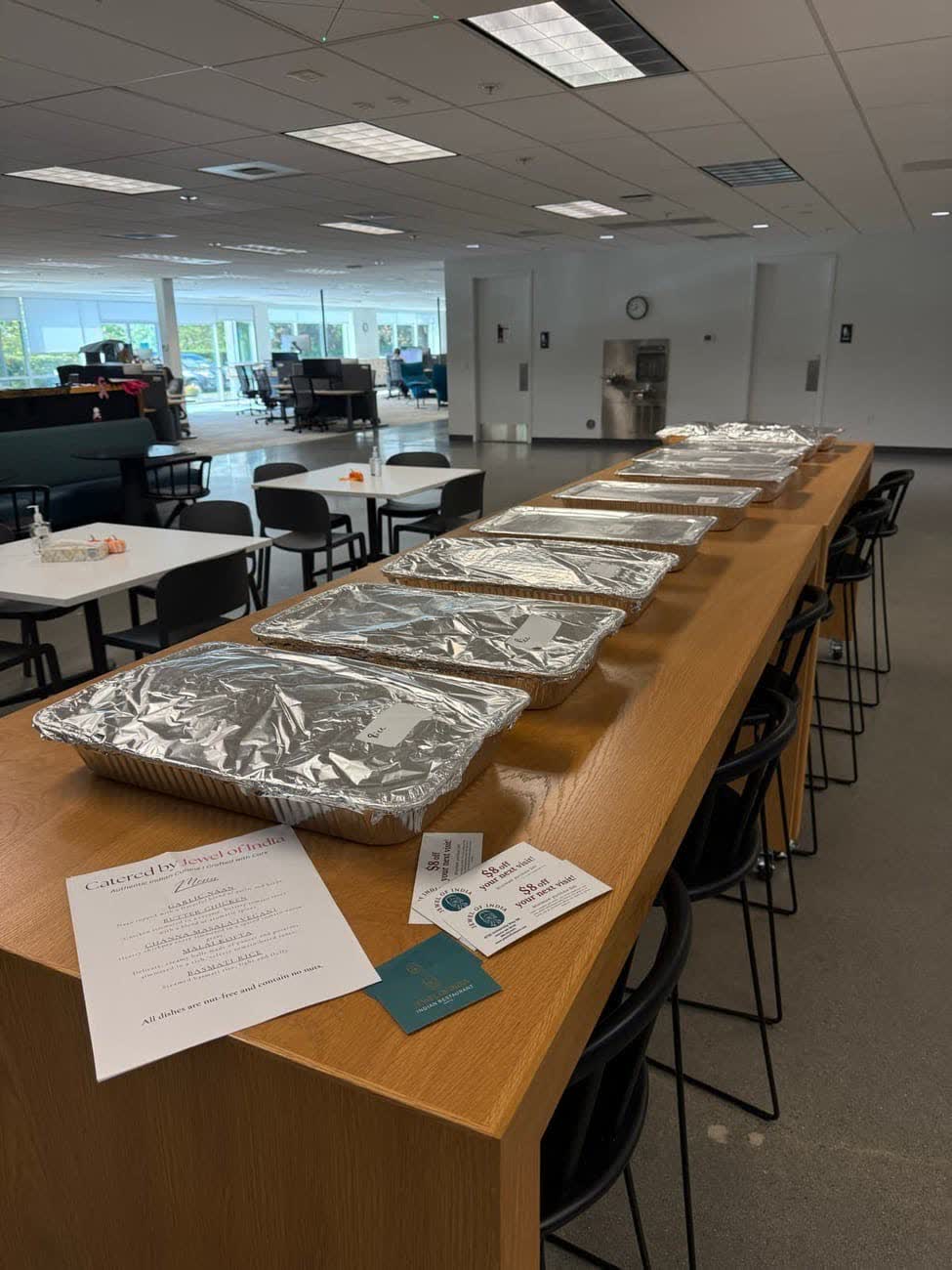 Indian catering spread laid out in trays ready to serve
